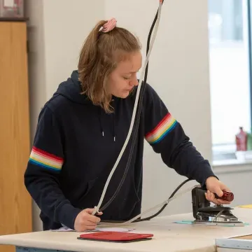 Student working in the Costume Shop at the Pablo Center 